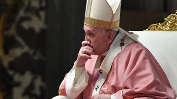 Pope Francis listens to Philippine Cardinal Luis Antonio Tagle (not in picture) during a mass to mark 500 years of Christianity in the Philippines, on March 14, 2021 at St. Peter's Basilica in The Vatican. Photo by TIZIANA FABI/POOL/AFP via Getty Images