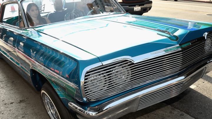 Lowrider automobiles are displayed at the premiere of "Lowriders" during opening night of the 2016 Los Angeles Film Festival at ArcLight Cinemas' Cinerama Dome on June 1, 2016 in Hollywood, California. Photo by Amanda Edwards/WireImage