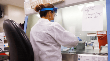 Adriana Cardenas, a medical technologist processes test samples for the coronavirus at the AdventHealth Tampa labs on June 25, 2020 in Tampa, Florida. Photo by Octavio Jones/Getty Images