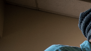 Kelly Russell takes the temperature of a patient at a vaccination site at a senior center on March 29, 2021 in San Antonio, Texas. Photo by Sergio Flores/Getty Images