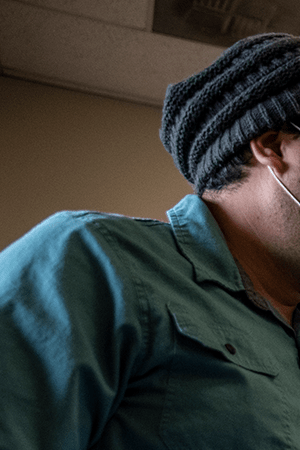 Kelly Russell takes the temperature of a patient at a vaccination site at a senior center on March 29, 2021 in San Antonio, Texas. Photo by Sergio Flores/Getty Images