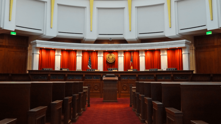 The Colorado Supreme Court courtroom, located on the fourth floor of the Ralph L. Carr Colorado Judicial Center, located at 2 East 14th Avenue in Denver, Colorado. Photo by Jeffrey Beall/Wikimedia Commons