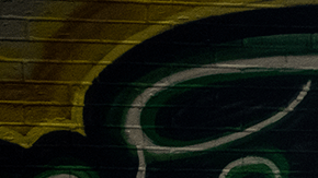 Flowers adorn a mural of Vanessa Guillen, a soldier based at nearby Fort Hood on July 6, 2020 in Austin, Texas. Photo by Sergio Flores/Getty Images