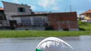 Health professionals help patients with symptoms of the new coronavirus brought on a boat ambulance from Vila Amazonia community upon their arrival in Parintins, Amazonas state, Brazil, on June 27, 2020. Photo by MICHAEL DANTAS/AFP via Getty Images