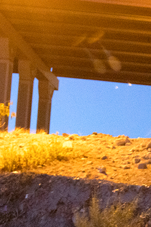 Two men with son in their arms, cross the Rio Bravo to surrender to the authorities with the intention of seeking political asylum in the United States, from Ciudad Juarez, in the Mexican state of Chihuahua, to El Paso, in the US state of Texas, on May 11, 2021. Photo by David Peinado/NurPhoto via Getty Images