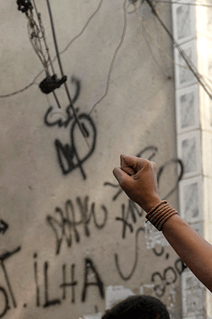 Residentes protest after a police operation against alleged drug traffickers at the Jacarezinho favela in Rio de Janeiro, Brazil, on May 06, 2021. Photo by MAURO PIMENTEL/AFP via Getty Images
