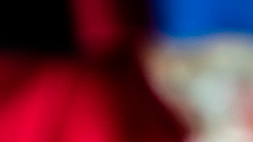 A woman puts on a face mask after recieving food and hygiene kits to face the new Coronavirus (Covid-19) in the City of Jinotega about 150km from Managua on September 17, 2020. Photo by INTI OCON/AFP via Getty Images.