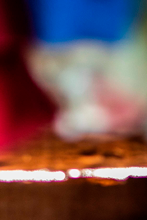 A woman puts on a face mask after recieving food and hygiene kits to face the new Coronavirus (Covid-19) in the City of Jinotega about 150km from Managua on September 17, 2020. Photo by INTI OCON/AFP via Getty Images.