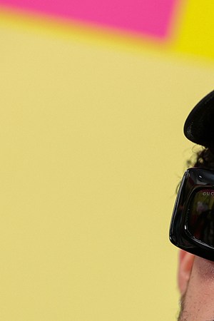 Bad Bunny poses backstage for the 2021 Billboard Music Awards, broadcast on May 23, 2021 at Microsoft Theater in Los Angeles, California.