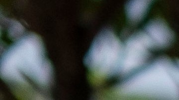 A man wearing a surgical mask sits in front of the emergency room entrance of the Ashford Presbyterian Community Hospital where the first coronavirus patient on the island died earlier in the day in San Juan, Puerto Rico on March 21, 2020. - Almost one billion people were confined to their homes worldwide as the global coronavirus death toll topped 12,000 and US states rolled out stay-at-home measures already imposed across swathes of Europe. More than a third of Americans were adjusting to life in various phases of virtual lockdown -- including in the US's three biggest cities of New York, Los Angeles and Chicago -- with more states expected to ramp up restrictions. (Photo by Ricardo ARDUENGO / AFP) (Photo by RICARDO ARDUENGO/AFP via Getty Images)