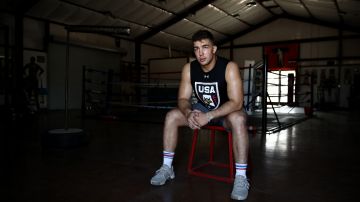TULARE, CALIFORNIA - JUNE 06:  Olympic hopeful boxer Richard Torrez Jr.  poses for a portrait in his father's gym during a training session on June 06, 2020 in Tulare, California. Torrez Jr. was one of 13 boxers selected to represent Team USA at the Tokyo 2020 Olympic Games Boxing Qualifiers in Argentina, but the qualifier was canceled due to the coronavirus. The 20-year-old has won numerous international tournaments, and is currently ranked fifth in the world in the super heavyweight weight class. The training center in Colorado is currently closed so Torrez Jr. continues to train at home with his father, who is his coach. His father has implemented many different types of training methods, such as hitting cement rocks with a sledge hammer, filling up wheel barrels with sand, and flipping over tractor tires. Athletes across the globe are now training in isolation under strict policies in place due to the Covid-19 pandemic.  (Photo by Ezra Shaw/Getty Images)