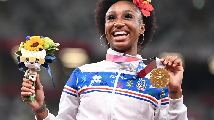 Gold medalist Jasmine Camacho-Quinn of Puerto Rico reacts on the awarding ceremony of the women's 100m hurdle at the Tokyo 2020 Olympic Games in Tokyo, Japan, Aug. 2, 2021. (Photo by Li Yibo/Xinhua via Getty Images)