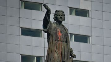 Christopher Columbus statue painted red.