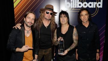 Mana poses with an award in the press room at the 2018 Billboard Latin Music Awards at the Mandalay Bay Events Center on April 26, 2018.