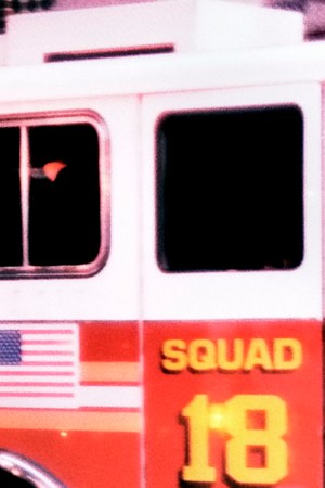 A group of New York City firefighters ready themselves for duty.