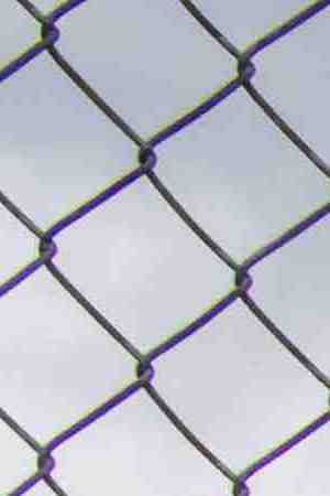 HOUSTON, TEXAS - NOVEMBER 09: A woman views a memorial dedicated to those who died at the Astroworld festival outside of NRG Park on November 09, 2021 in Houston, Texas. Eight people were killed and dozens injured last Friday in a crowd surge during a Travis Scott concert at the Astroworld music festival. Several lawsuits have been filed against Scott, and authorities continue investigations around the event. Scott, a Houston-native rapper and musician, launched the festival in 2018.