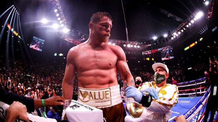LAS VEGAS, NEVADA - NOVEMBER 06: Canelo Alvarez celebrates his 11th round technical knock out win against Caleb Plant after their championship bout for Alvarez's WBC, WBO and WBA super middleweight titles and Plant's IBF super middleweight title at MGM Grand Garden Arena on November 06, 2021 in Las Vegas, Nevada.