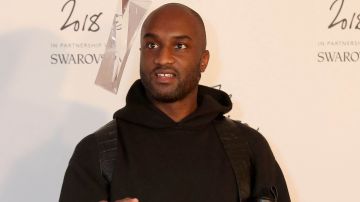 Virgil Abloh. Louis Vuitton's US fashion designer, poses after winning the Urban Luxe Award during the British Fashion Awards 2018 in London on December 10, 2018. - The Fashion Awards are an annual celebration of creativity and innovation will shine a spotlight on exceptional individuals and influential businesses that have made significant contributions to the global fashion industry over the past twelve months. - RESTRICTED TO EDITORIAL USE - NO MARKETING NO ADVERTISING CAMPAIGNS