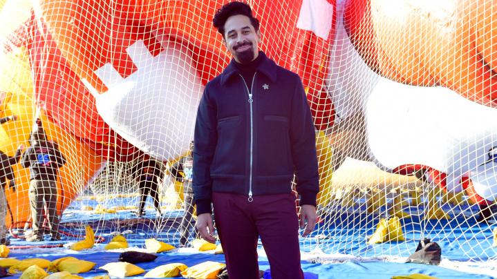 NEW YORK, NEW YORK - NOVEMBER 13: Vice President, Executive Producer of Macy's Branded Entertainment, Will Coss poses in front of the new balloons Macy's unveils them for the 95th Annual Macy's Thanksgiving Day Parade® on November 13, 2021 in New York City.