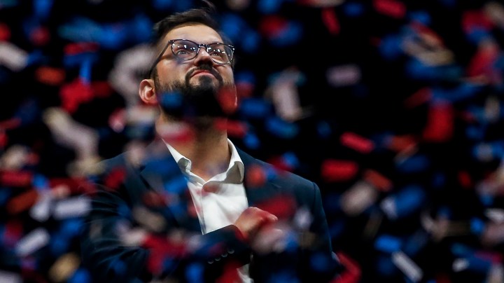 SANTIAGO, CHILE - DECEMBER 19: Gabriel Boric president elect of Chile reacts before giving a speech to his supporters after the presidential runoff election on December 19, 2021 in Santiago, Chile. (Photo by Marcelo Hernandez/Getty Images)