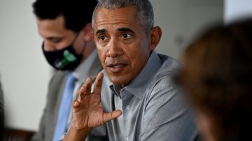 GLASGOW, SCOTLAND - NOVEMBER 08: Former US President Barack Obama gestures as he speaks during a round table meeting at the University of Strathclyde on November 08, 2021 in Glasgow, Scotland. Day Nine of the 2021 climate summit in Glasgow will focus on delivering the practical solutions needed to adapt to climate impacts and address loss and damage. This is the 26th "Conference of the Parties" and represents a gathering of all the countries signed on to the U.N. Framework Convention on Climate Change and the Paris Climate Agreement. The aim of this year's conference is to commit countries to net-zero carbon emissions by 2050.