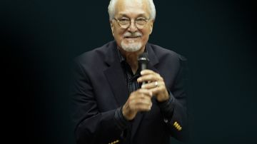 Paquito Guzman performs at the funeral service for Cheo Feliciano at Coliseo Roberto Clemente on April 20, 2014 in San Juan, Puerto Rico.