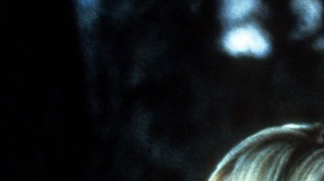 Britney Spears, Taryn Manning,and Zoe Saldana gathered around in a scene from the film 'Crossroads', 2002. (Photo by Paramount/Getty Images)