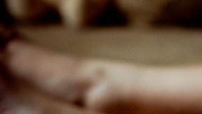 Woman hand into bowl of popcorn. National Popcorn Day