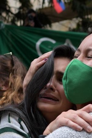 Abortion rights activists celebrate the decision of Colombia's high court to decriminalise abortion up to 24 weeks of pregnancy in Bogota, on February 21, 2022. (Photo by Raul ARBOLEDA / AFP) (Photo by RAUL ARBOLEDA/AFP via Getty Images)