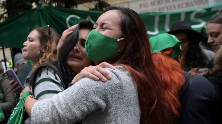 Abortion rights activists celebrate the decision of Colombia's high court to decriminalise abortion up to 24 weeks of pregnancy in Bogota, on February 21, 2022. (Photo by Raul ARBOLEDA / AFP) (Photo by RAUL ARBOLEDA/AFP via Getty Images)