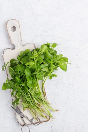 Cilantro on cutting board