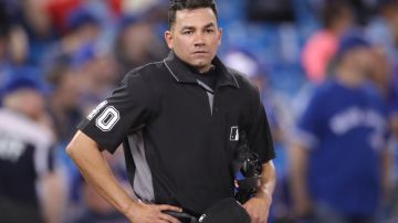 TORONTO, ON - MAY 22: Home plate umpire Roberto Ortiz #40 looks on during the Toronto Blue Jays MLB game against the Boston Red Sox at Rogers Centre on May 22, 2019 in Toronto, Canada. (Photo by Tom Szczerbowski/Getty Images)