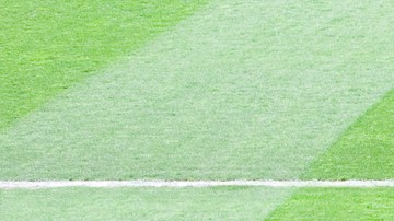 Empty football stadium - stock photo