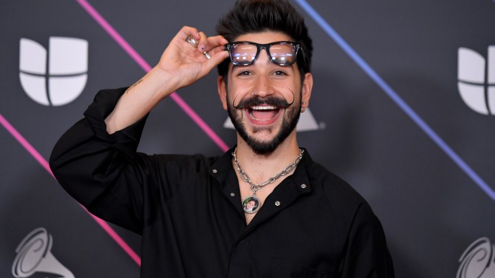 LAS VEGAS, NEVADA - NOVEMBER 18: Camilo poses in the press room during The 22nd Annual Latin GRAMMY Awards at MGM Grand Garden Arena on November 18, 2021 in Las Vegas, Nevada. (Photo by David Becker/Getty Images for The Latin Recording Academy)