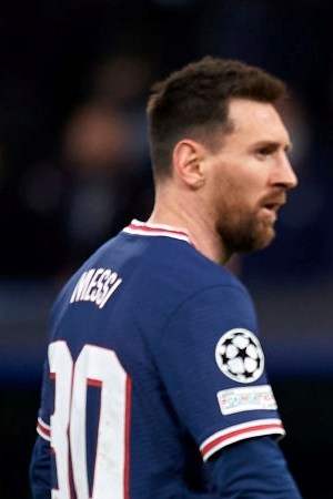 Leo Messi and Neymar of PSG during the UEFA Champions League Round Of Sixteen Leg Two match between Real Madrid and Paris Saint-Germain at Estadio Santiago Bernabeu on March 9, 2022 in Madrid, Spain. (Photo by Jose Breton/Pics Action/NurPhoto via Getty Images)