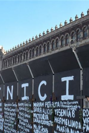 MEXICO CITY, MEXICO - MARCH 07: Metal retaining walls were painted by women before the feminist march on Monday on March 7, 2021 in Mexico City, Mexico. (Photo by Medios y Media/Getty Images)