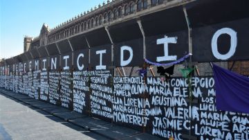 MEXICO CITY, MEXICO - MARCH 07: Metal retaining walls were painted by women before the feminist march on Monday on March 7, 2021 in Mexico City, Mexico. (Photo by Medios y Media/Getty Images)