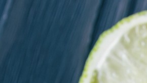 Bowl of guacamole with tortilla chips - stock photo
