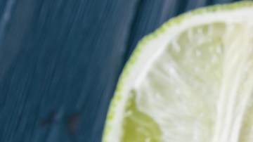 Bowl of guacamole with tortilla chips - stock photo