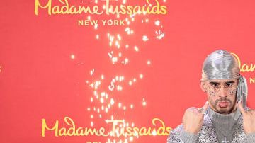 NEW YORK, NEW YORK - APRIL 19: Bad Bunny (C) reveals wax figures for Madame Tussauds New York and Madame Tussauds Orlando at Madame Tussauds on April 19, 2022 in New York City. (Photo by Jamie McCarthy/Getty Images for Madame Tussauds New York)