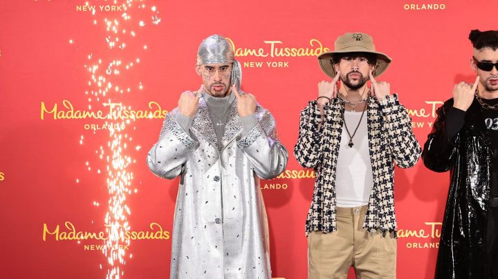 NEW YORK, NEW YORK - APRIL 19: Bad Bunny (C) reveals wax figures for Madame Tussauds New York and Madame Tussauds Orlando at Madame Tussauds on April 19, 2022 in New York City. (Photo by Jamie McCarthy/Getty Images for Madame Tussauds New York)