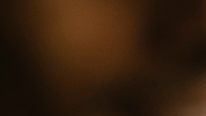 Group of friends toasting beer glasses at table in bar - stock photo