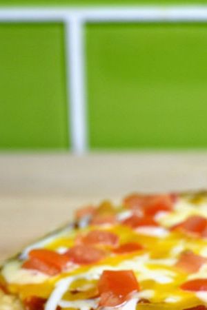 IRVINE, CA - SEPTEMBER 12: Taco Bell's Mexican Pizza remains a popular item and menu staple. (Photo by Joshua Blanchard/Getty Images for Taco Bell)