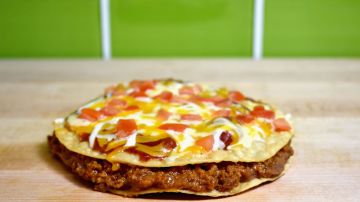 IRVINE, CA - SEPTEMBER 12: Taco Bell's Mexican Pizza remains a popular item and menu staple. (Photo by Joshua Blanchard/Getty Images for Taco Bell)