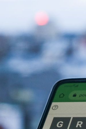 Wordle game displayed on a phone screen is seen in this illustration photo taken in Krakow, Poland on February 6, 2022. (Photo illustration by Jakub Porzycki/NurPhoto via Getty Images)