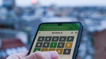 Wordle game displayed on a phone screen is seen in this illustration photo taken in Krakow, Poland on February 6, 2022. (Photo illustration by Jakub Porzycki/NurPhoto via Getty Images)