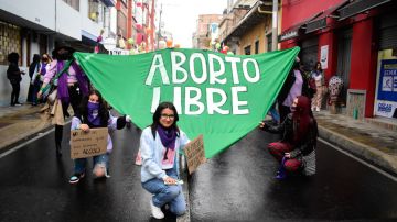 Women celebrate the decriminalization of abortions in Colombia as women participate in the International Womens day demonstrations in Pasto - Narino, Colombia on March 8, 2022. (Photo by: Elizabeth Palchucan/Long Visual Press/Universal Images Group via Getty Images)
