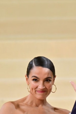 NEW YORK, NEW YORK - SEPTEMBER 13: Alexandria Ocasio-Cortez and Riley Roberts leave the 2021 Met Gala Celebrating In America: A Lexicon Of Fashion at Metropolitan Museum of Art on September 13, 2021 in New York City. (Photo by James Devaney/GC Images)