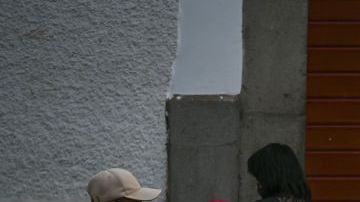 Street stands outside San Pedro market in Cusco, Peru.