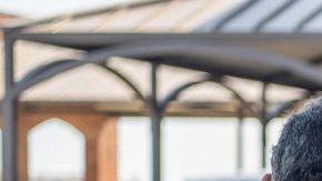 Uvalde community members distribute food to people waiting to donate blood at the South Texas Blood Bank's emergency blood drive on May 25, 2022.